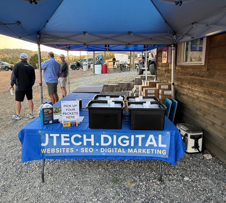 JTech Communications banner at Western Challenge tent