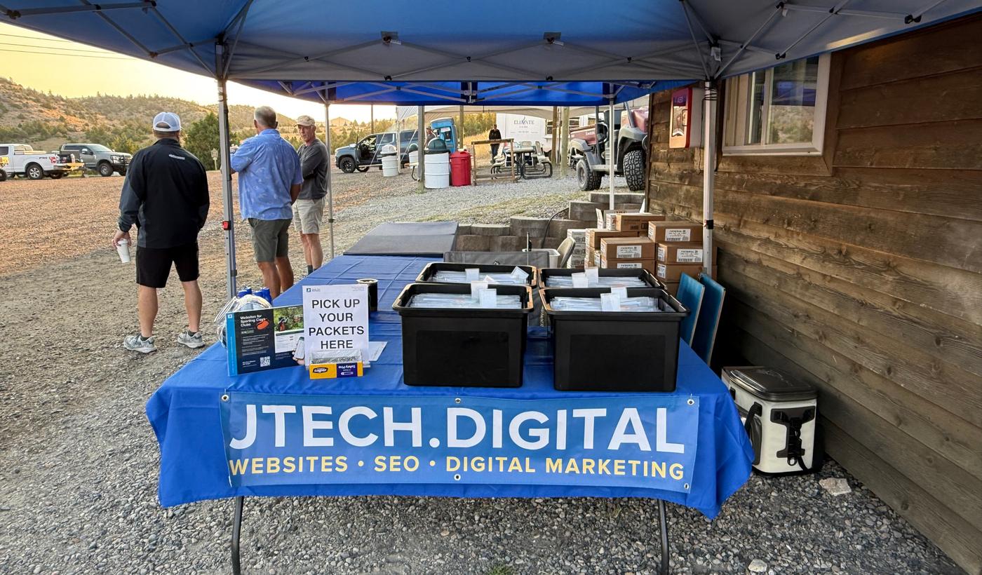 JTech Communications banner at Western Challenge tent