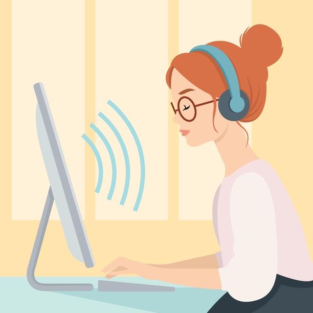 A woman browsing the web using screen-reading technology