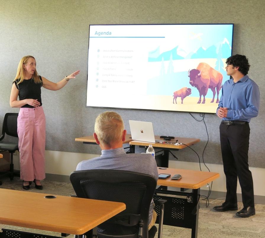 The JTech team presenting AI in business