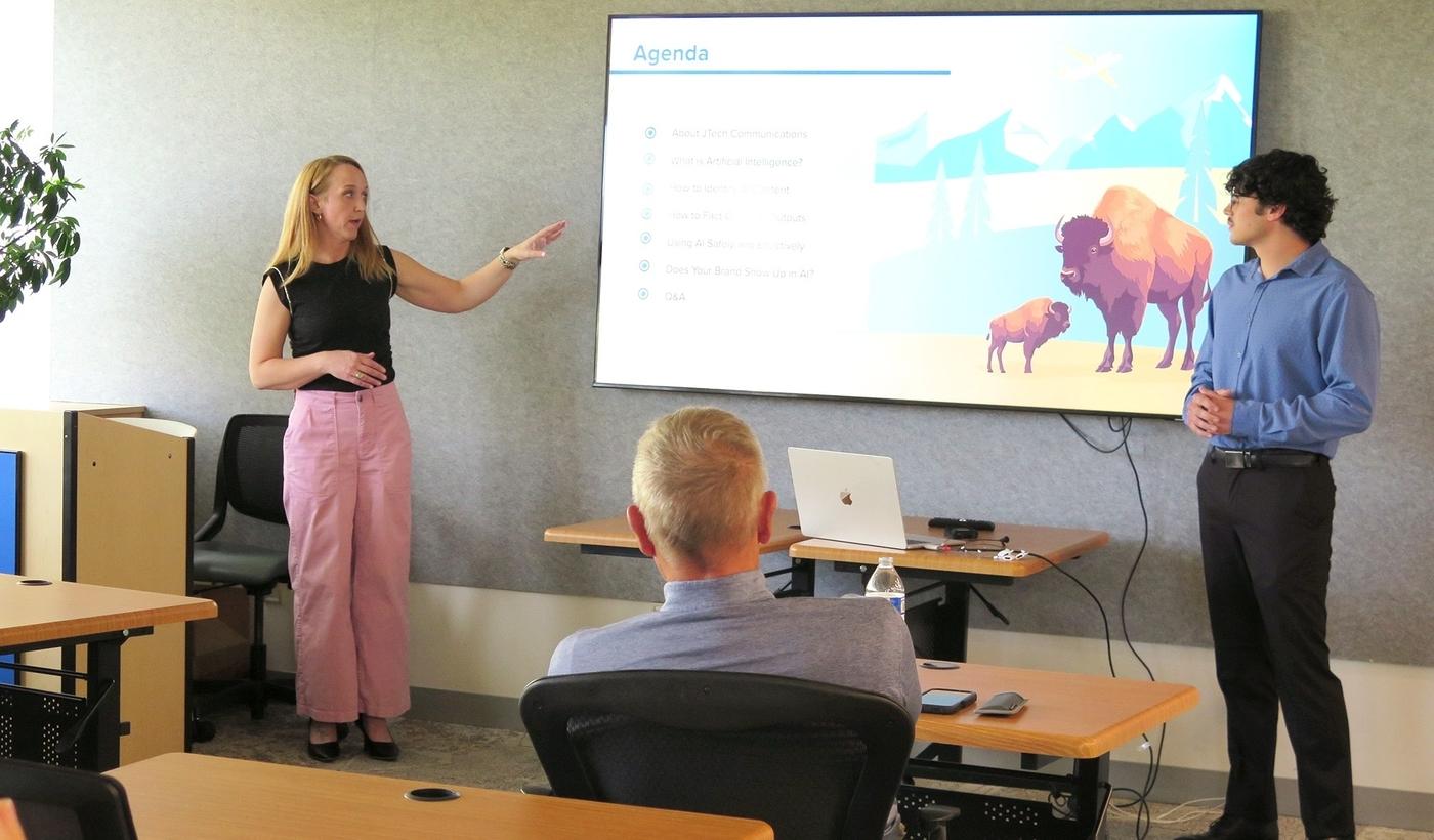 The JTech team presenting AI in business