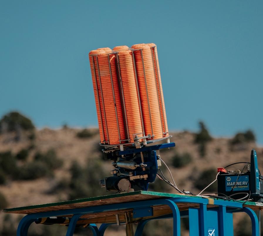 Clay thrower elevated in the air
